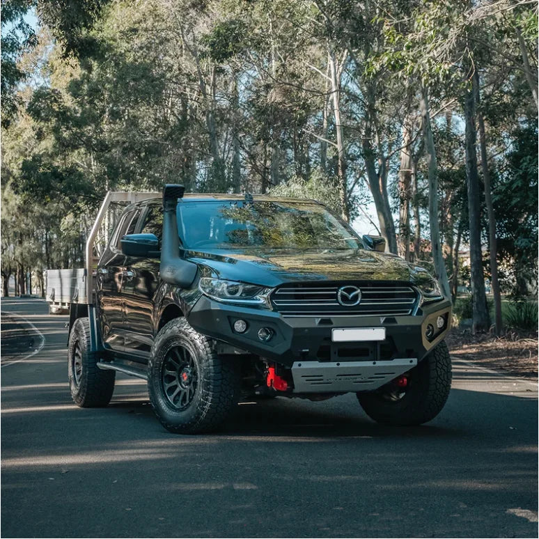 Black Mazda pickup truck with Rockarmor GT Steel bull bar and driving lights