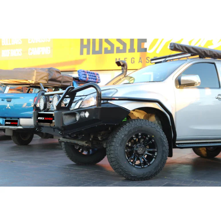 Off-road isuzu dmax with black steel rockarmor brushbar and aftermarket tires suited for rugged terrain use