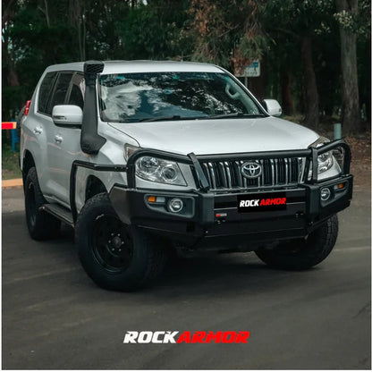 Silver off-road vehicle with black accessories featuring the Rockarmor Elite Steel Bullbar for Toyota Prado 150 2009-2013