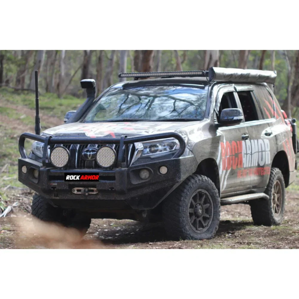Off-road Toyota Prado FJ150 with black Rockarmor Elite steel bull bar replacement full bar for enhanced protection