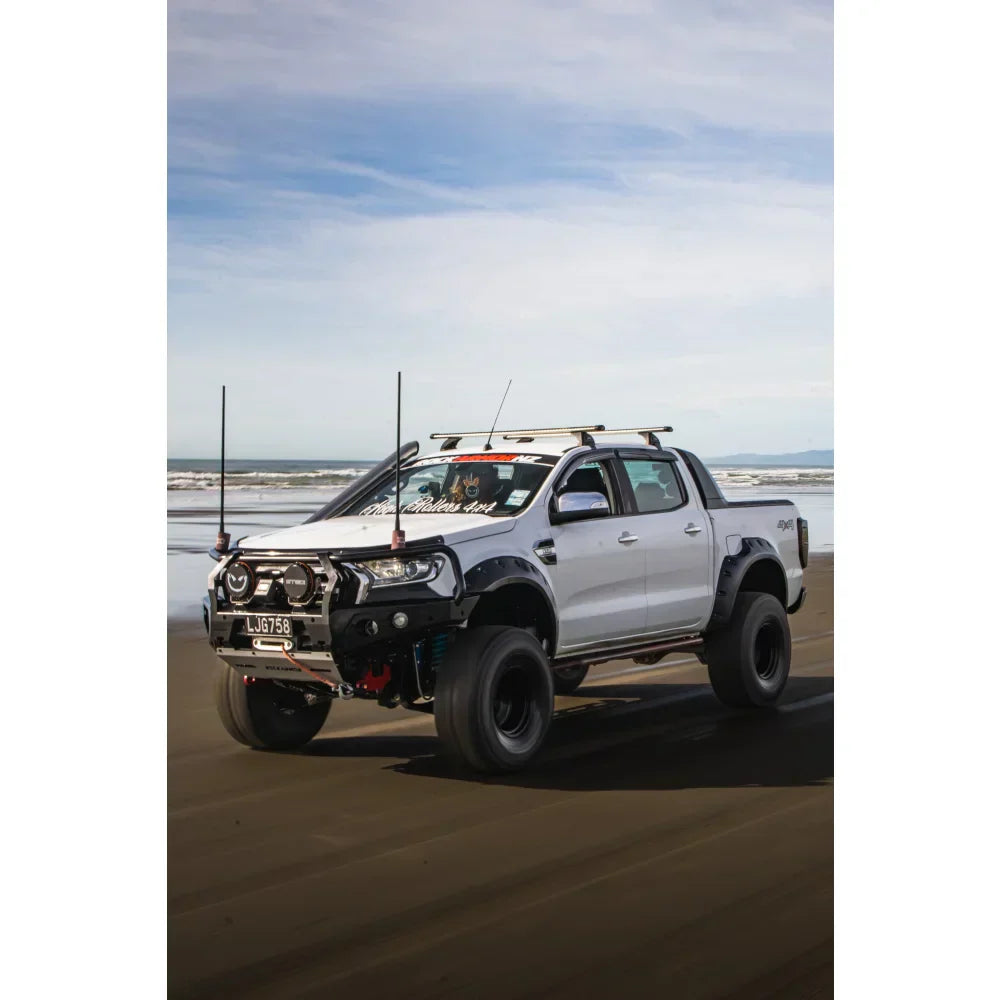 Modified white Ford Ranger PX2 pickup truck equipped with rockarmor gt steel hoop bullbar and synthetic winch rope combo pack