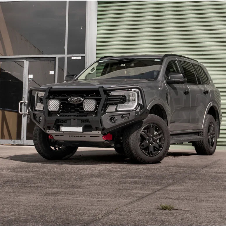 Gray ford suv fitted with rockarmor gt steel hoop bullbar featuring twin slotted antenna for ford everest px 2 and px 3
