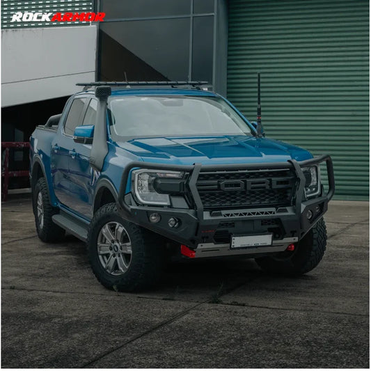 Blue Ford Ranger pickup truck with Rockarmor GT Bull aftermarket bull bar and driving lights
