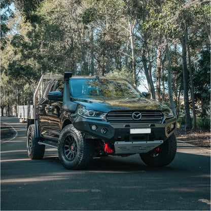 Black Mazda pickup truck with Rockarmor GT Steel bull bar and driving lights