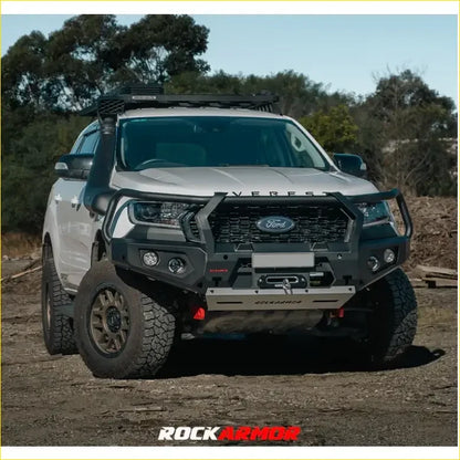Silver ford everest pickup truck with black rockarmor front bumper and roof rack in rockarmor rock pack setup