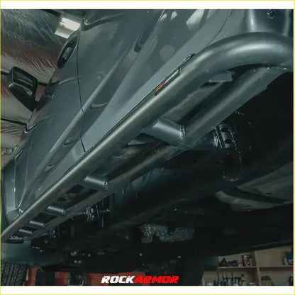 Black metal rock guard with rugged tubular design and visible welds for ranger raptor next gen 2023 gt hoopless bullbar