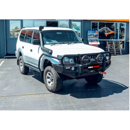 White off-road vehicle with black bull bar and Rockarmor Steel Rockslider Side Steps fitting video
